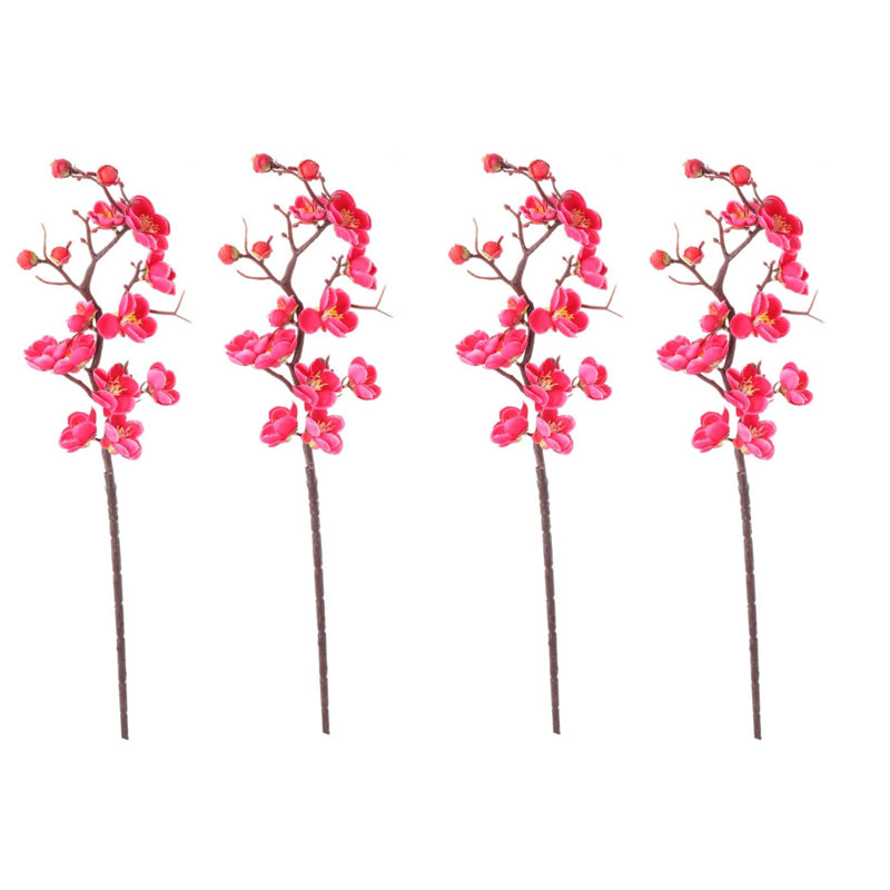 Arrangement de tiges de cerisier en fleurs, de buissons et de jets