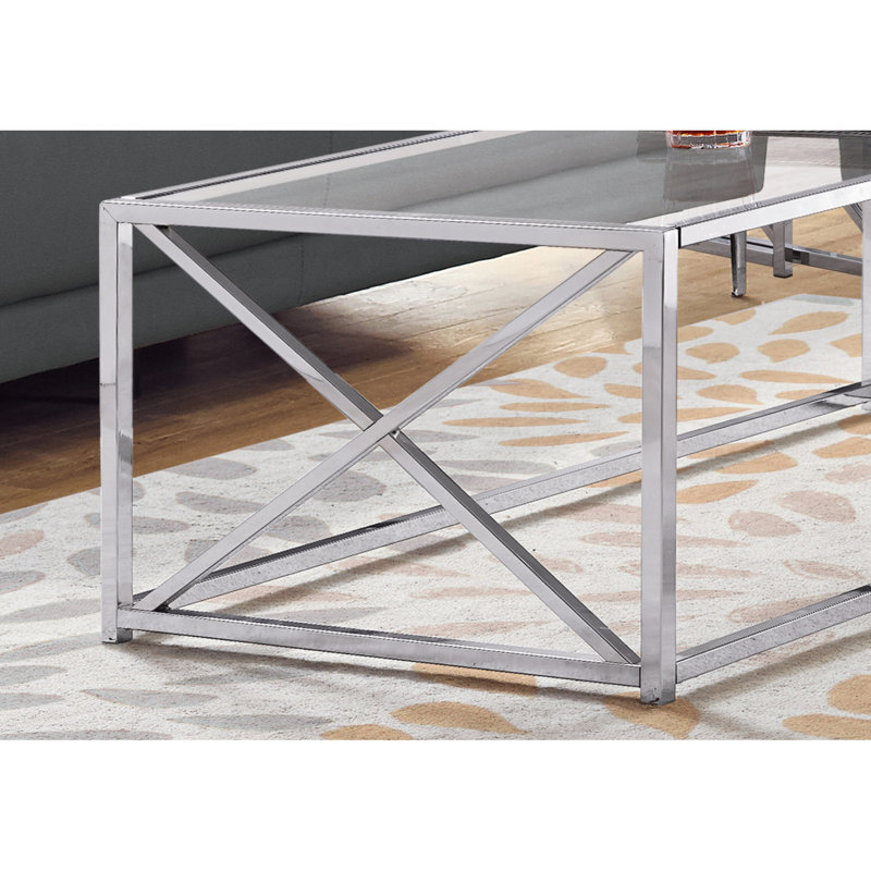 Table basse spacieuse rectangulaire: verre trempé transparent et table en métal poli avec base pour une utilisation polyvalente