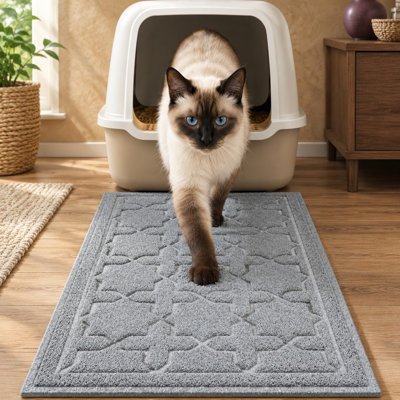 Gray 24 x 20 PVC litter box mat with waterproof protection and a non-slip backing; its trapping surface controls scatter, cleans easily, and helps keep floors cleaner.