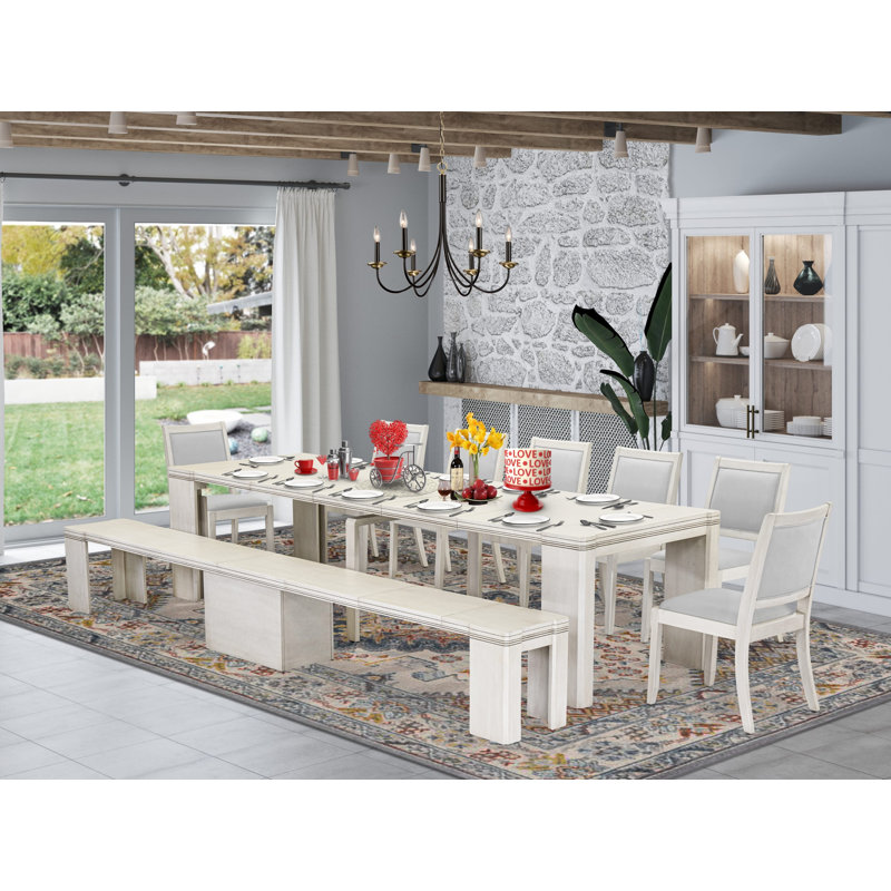 L'ensemble de table de cuisine 9 pièces comprend une table de salle à manger rectangulaire extensible, 7 chaises empilables en tissu de polyester et 1 banc moderne, blanc antique