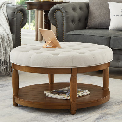 Grande table basse ronde avec repose-pieds rembourré en lin et grand repose-pieds avec rangement en bois