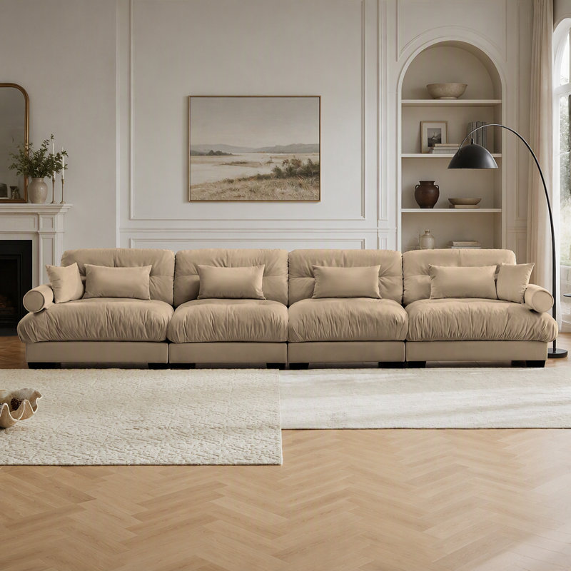 Canapé d'angle modulaire surdimensionné en velours ultra confortable avec pouf amovible, assise profonde et design convertible en L pour les salons modernes