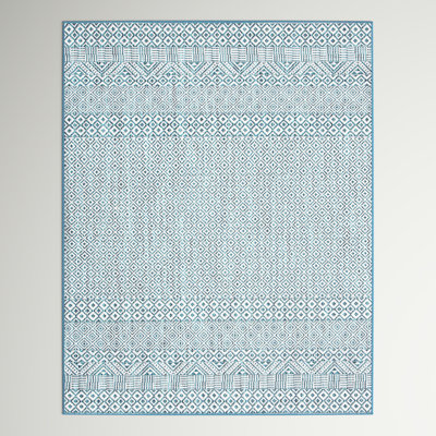 Tapis intérieur / extérieur ivoire / turquoise Milliken