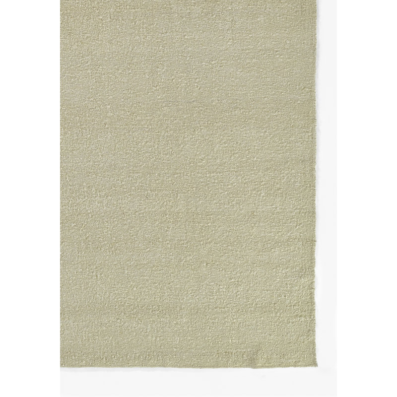 Koukila Ivory Solid Handwoven Wool 6' x 9' Area Rug