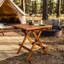 Petite table pliante en teck, finition huilée
