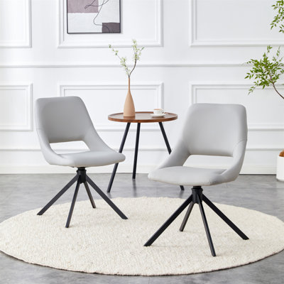 Ensemble de 4 chaises de salle à manger pivotantes et confortables, chaises de cuisine en métal avec revêtement en cuir résistant aux rayures Goldmesh et dossier haut (gris clair, ensemble de 4)