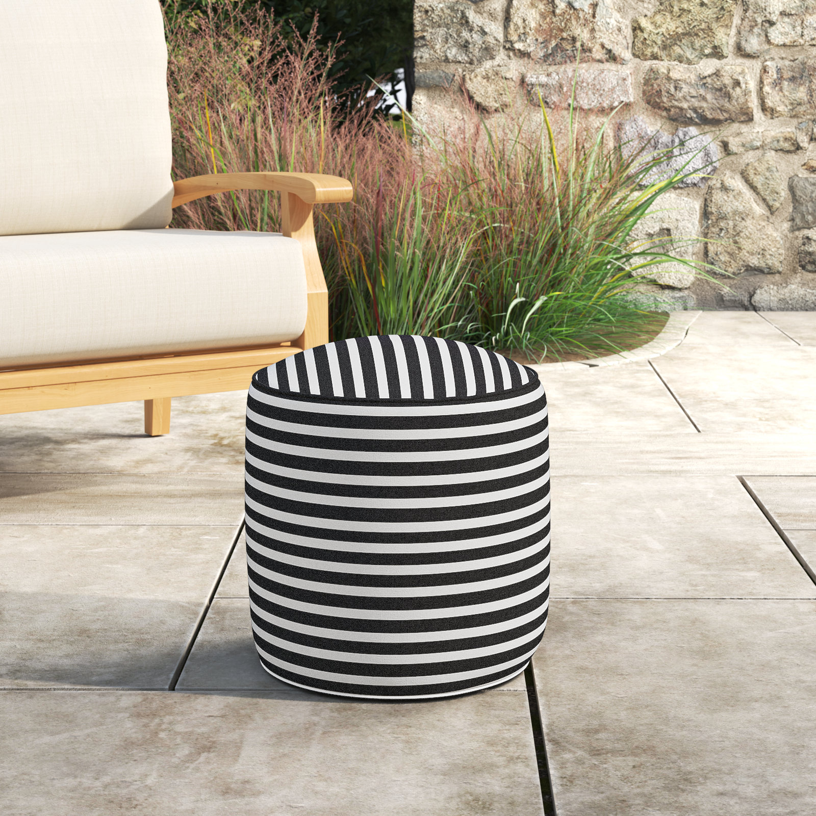Moseley Round Upholstered Outdoor Ottoman with Sunbrella® Cushion, Shore Classic Black Stripe Sunbrella®