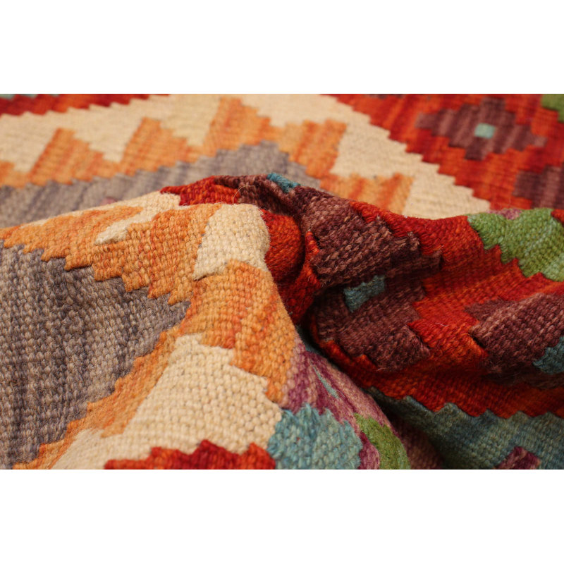 Tapis unique rouge de 5 pi x 6 pi 6 po Dunlo