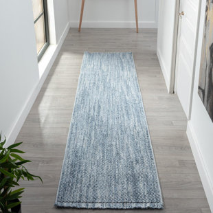 Tapis texturé à franges