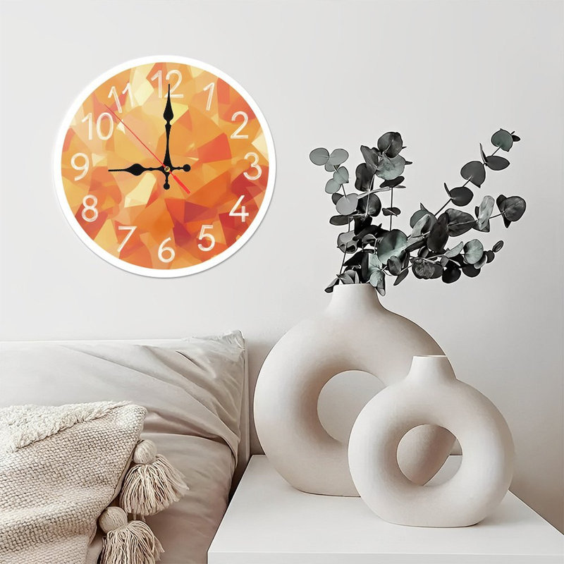 Horloge avec motif de pierres précieuses orange