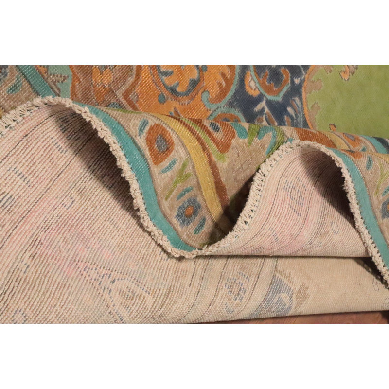 Tapis vert médaillon en laine vert 10 x 12