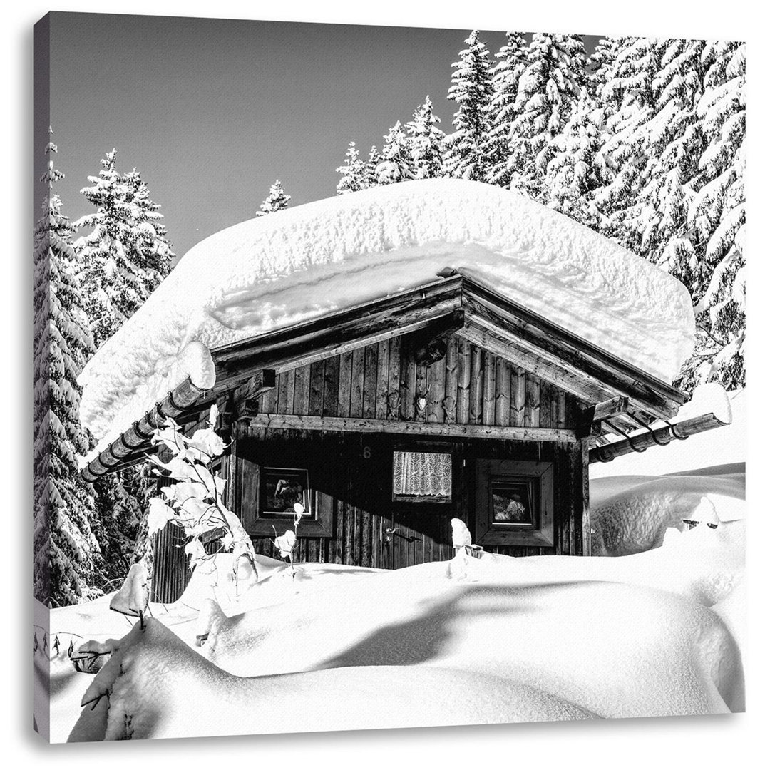 Leinwandbild Snowy Ski Hut in Alpine Forest