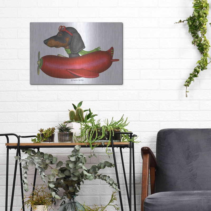 «Black Dachshund In Red Plane» par Danny Gordon, H 16 po x l 12 po