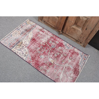 Elegant Vintage Turkish Rug Highlighting a Floral Pattern in Red Offers Traditional Home Decor