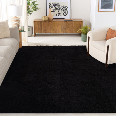 Tapis de couleur unie à poils longs Lindsay