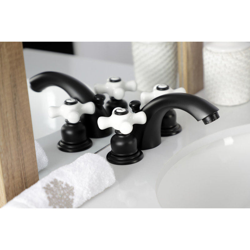 Kingston Brass Victorian Two-Handle 3-Hole Deck Mount Mini-Widespread Bathroom Faucet with Plastic Pop-Up, Matte Black