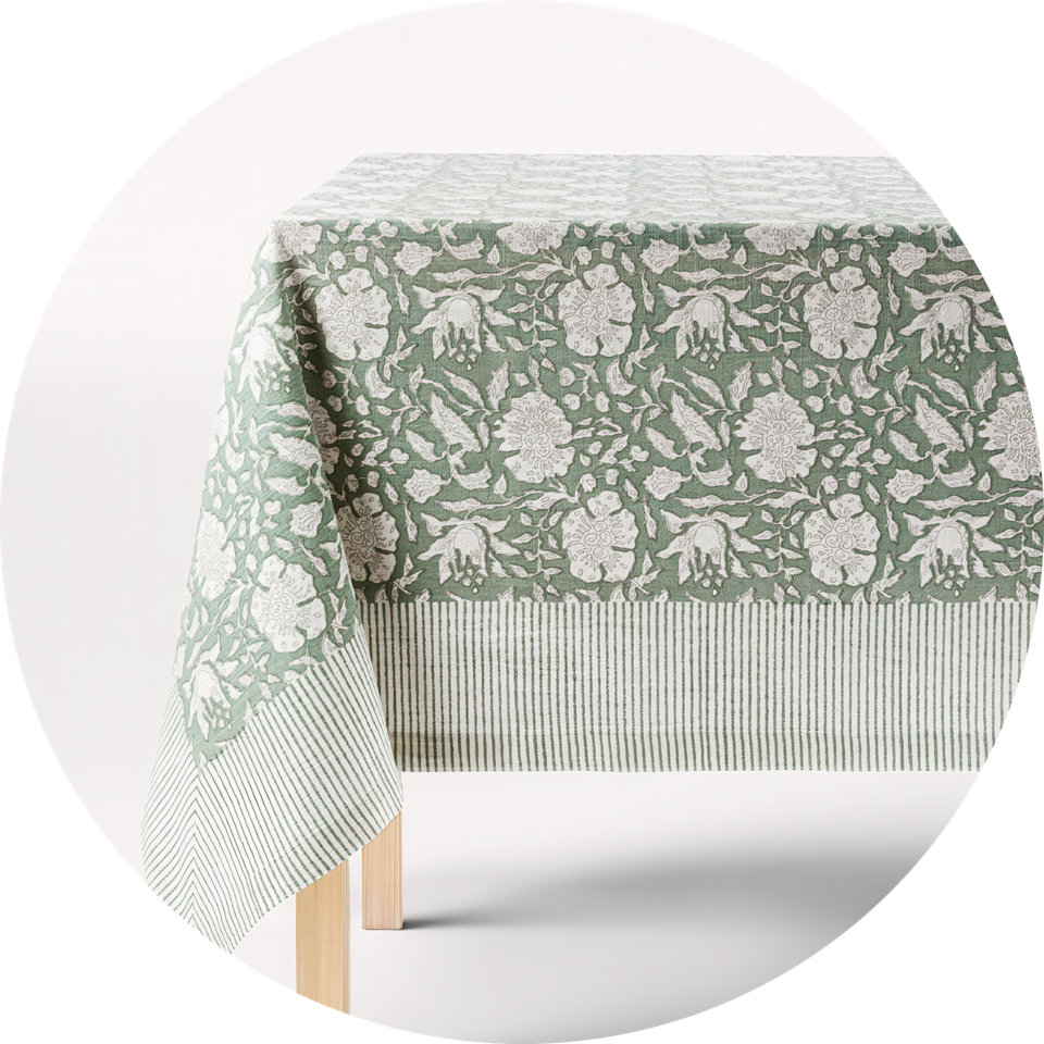 Green and white floral tablecloth