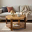 Table basse ronde avec tablette de rangement