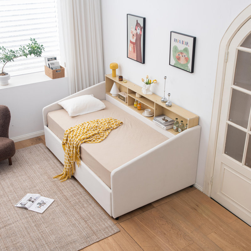 Guinette Upholstered Twin Daybed with Trundle and Headboard Shelf, Cream