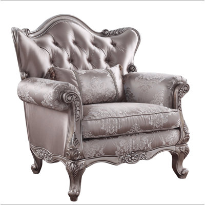 Chaise en tissu et champagne avec coussin