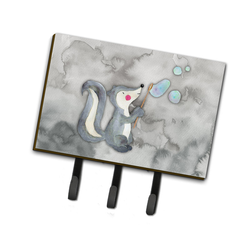 Garde-clef ou clé d’aquarelle moufette et bubbles