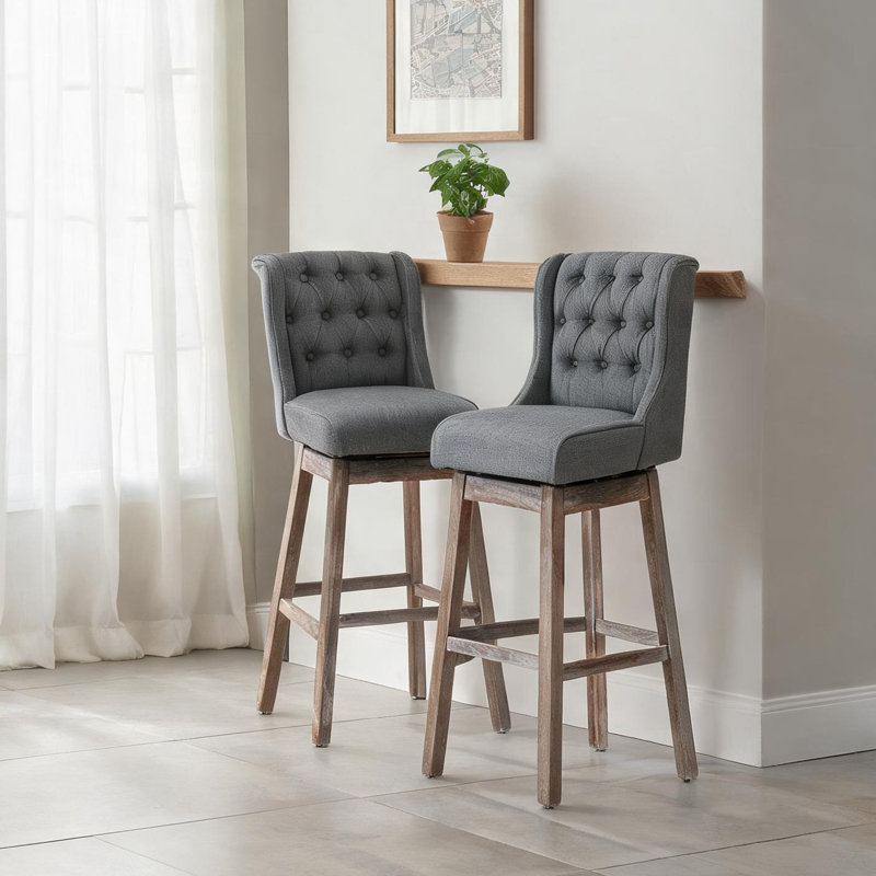 Tabourets de bar ergonomiques en lin beige, pivotants et avec repose-pieds, pour comptoir de cuisine (lot de 2).