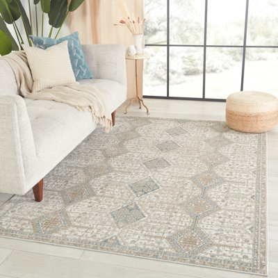 Tapis géométrique doré / bleu clair