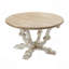 Table basse ronde en bois de 31,5 x 31,5 x 18,5 pouces avec finition vieillie et pieds sculptés.