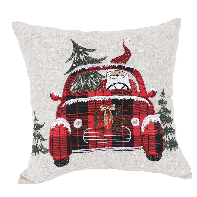  Coussin père Noël monté sur une voiture