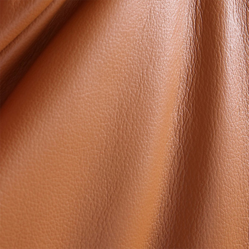 Causeuse coussin orange en cuir véritable, H 33,46 po x l 82,68 po x P 37,4 po