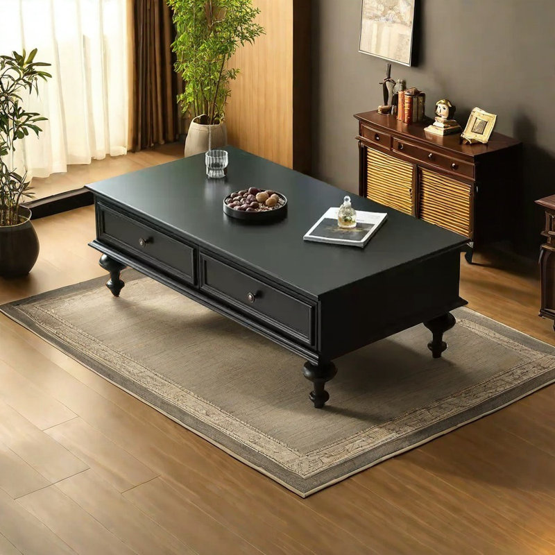 Table basse élégante avec poignées en métal et bois massif