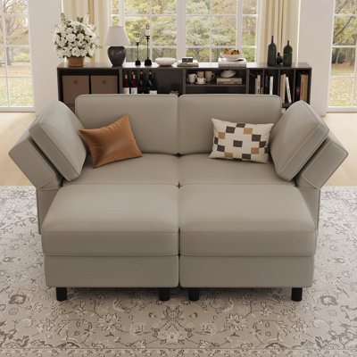 Canapé modulaire avec deux repose-pieds