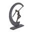 Figurine dansante avec croissant de lune