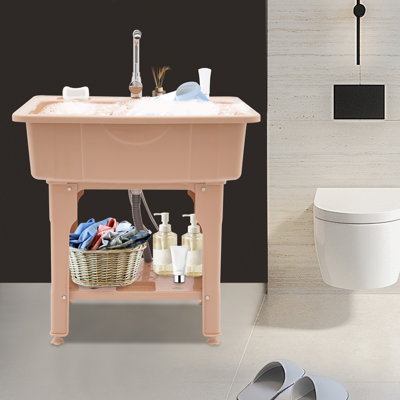 Spacious Laundry Sink With Storage Shelf And Soap Dish