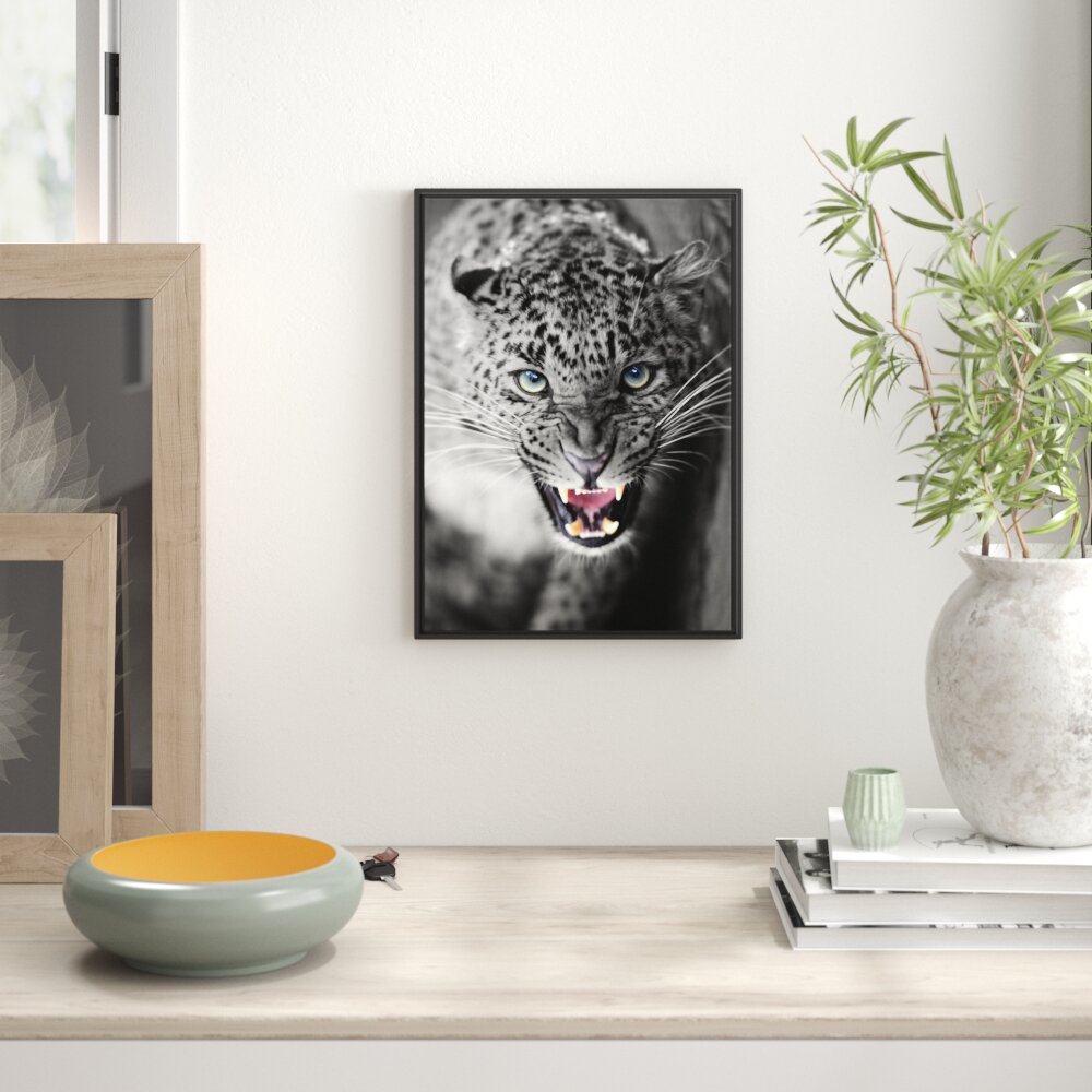 Gerahmtes Wandbild schöner fauchender Leopard