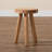 Eean Upholstered Teak Wood Ottoman
