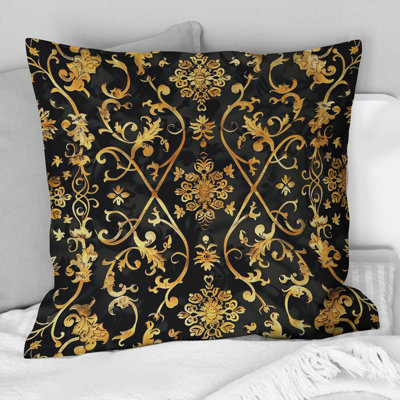 Coussin décoratif doré doré et noir
