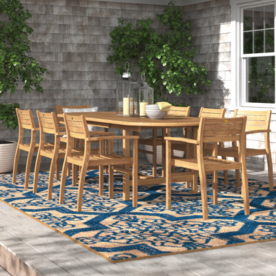 Anautica 8 - Person Teak Wood Patio Dining Set with Extendable Oval Table