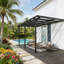 Pergola murale réglable avec toit en polycarbonate, parfaite pour l'extérieur et la protection solaire
