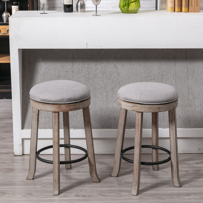 Tabouret de comptoir pivotant en bois massif de 25,6 po avec repose-pieds en métal Sefedin, Gris