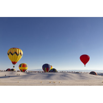 Balloons At White Sands National Monument, New Mexico, USA by Janssenkruseproductions - Wrapped Canvas Print