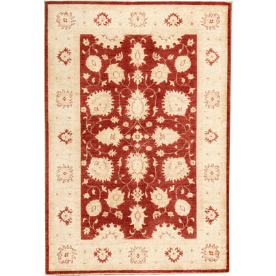 Tapis rouge et ivoire noué à la main de haute qualité