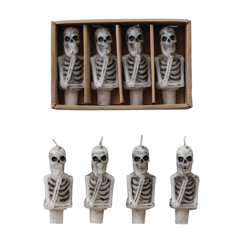Ensemble de bougies fuselées noir et blanc à motif squelette