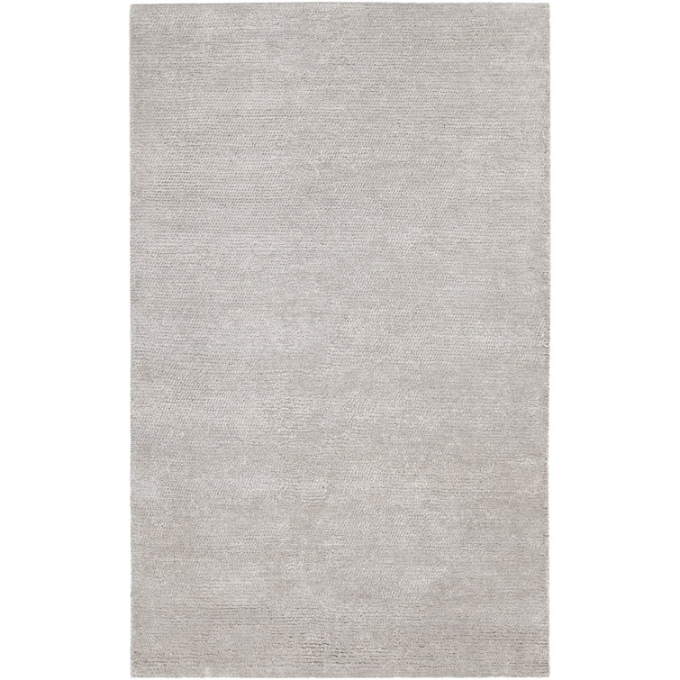 Tapis argenté en laine tissé à la main Reanna