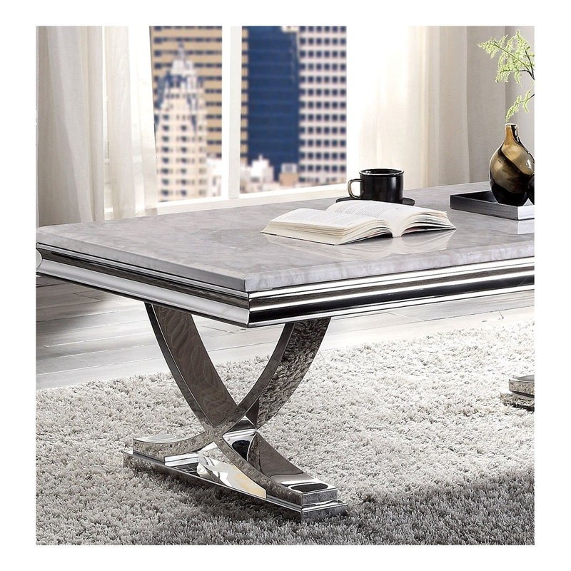 Table basse Glam Chrome avec plateau biseauté 18 mm et base piédestal Glam