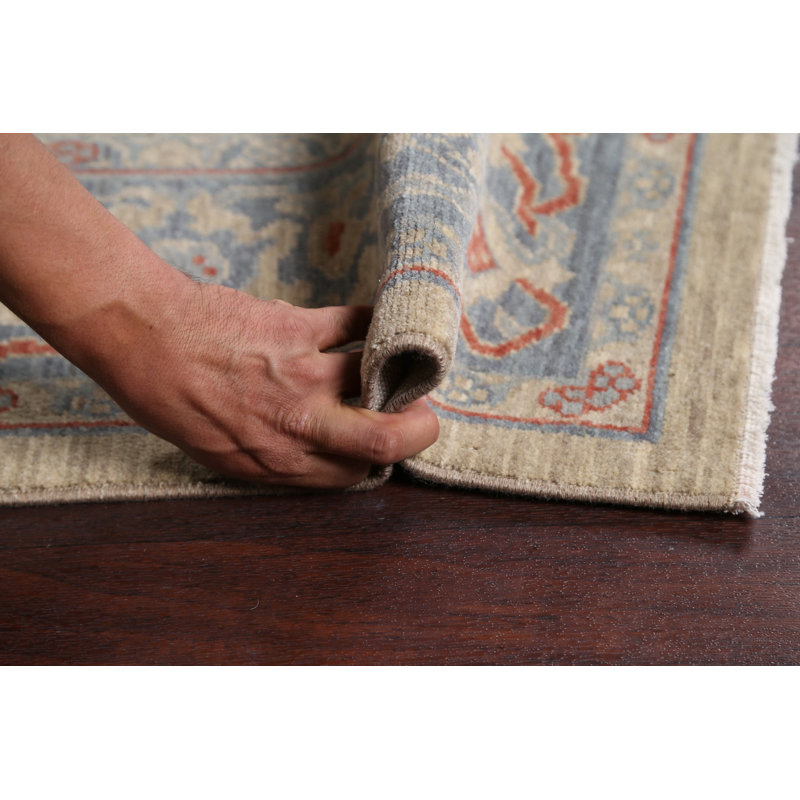 Tapis beige en laine