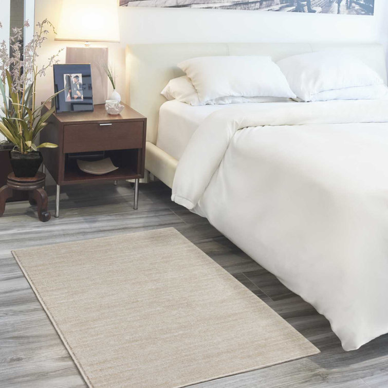 Mullican Sandy Solid Ivory/Beige Easy Care Indoor/Outdoor Area Rug
