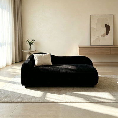 Minimalist black fabric chaise lounge