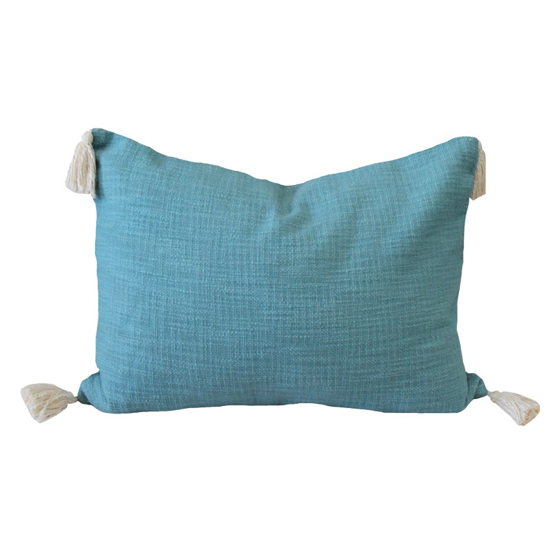 Housse de coussin lombaire bleue à pampilles