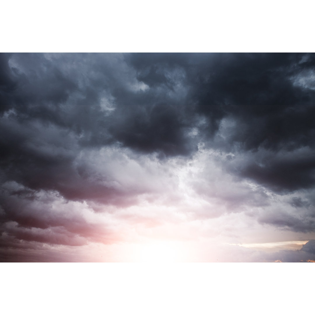 Stürmische Wolkenlandschaft mit Sonnenlicht von Themacx - Drucken